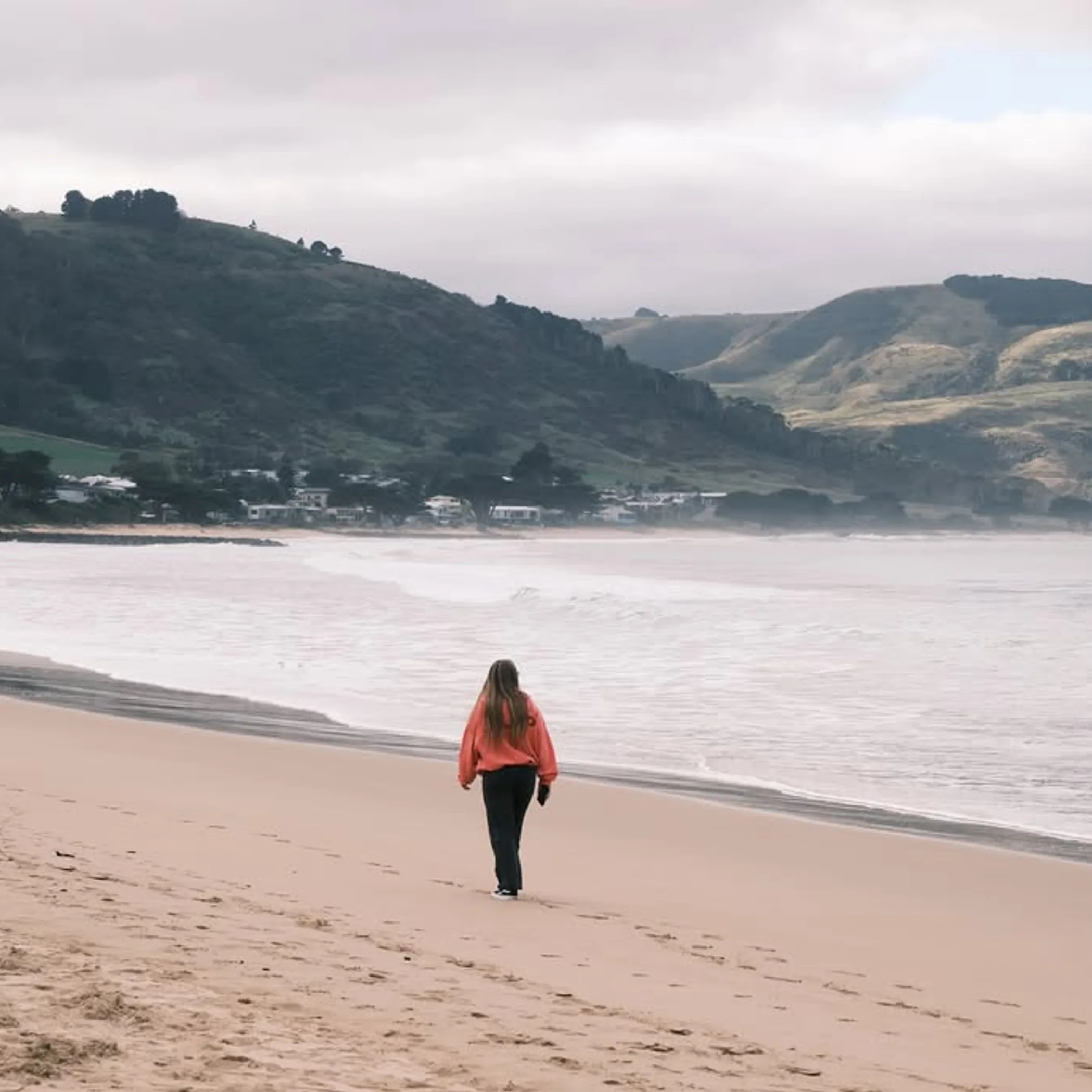 beach with coastal hills in winter
