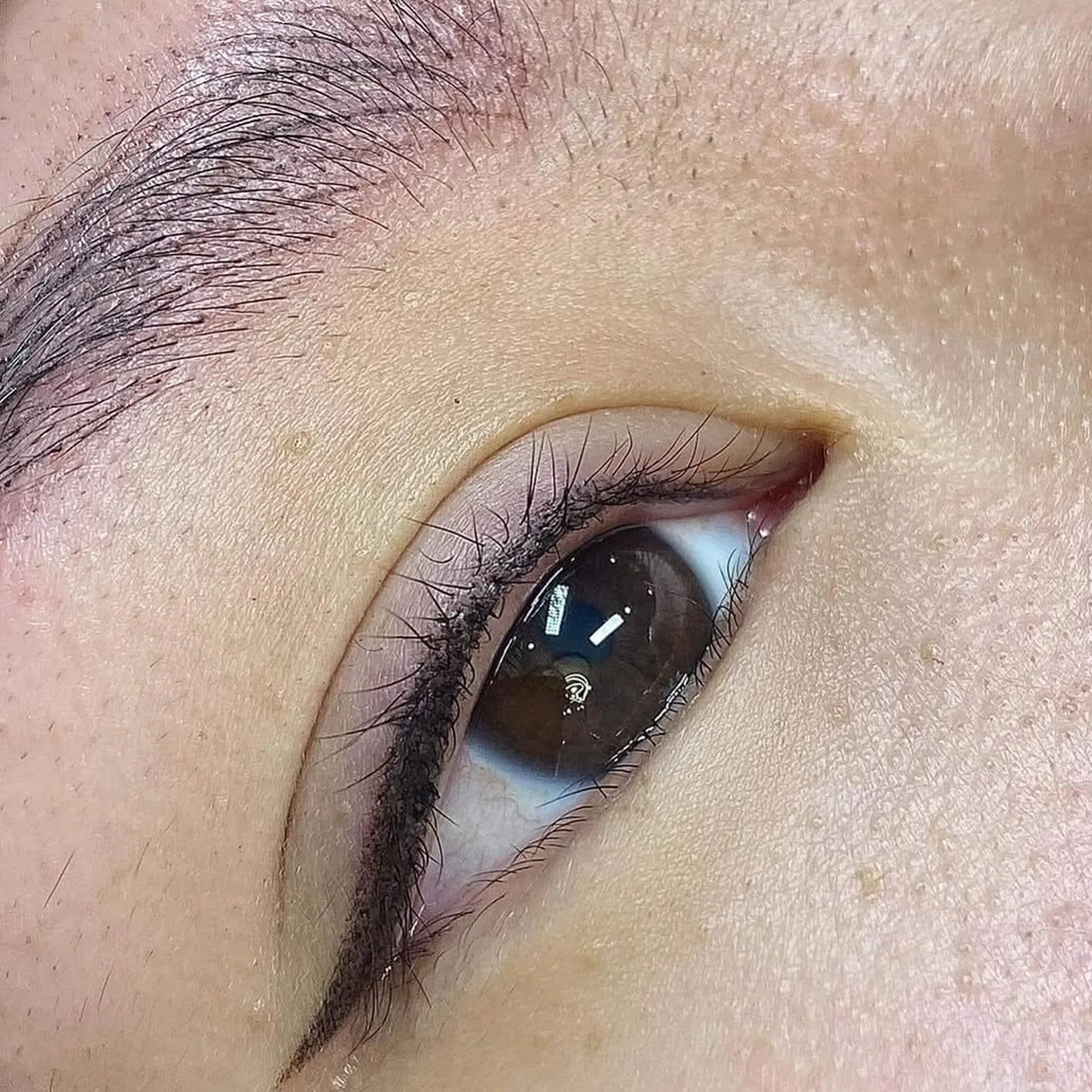 cosmetic tattooing microblading procedure close-up